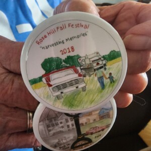 Linot's favorite button design featuring Tom and her grandson.